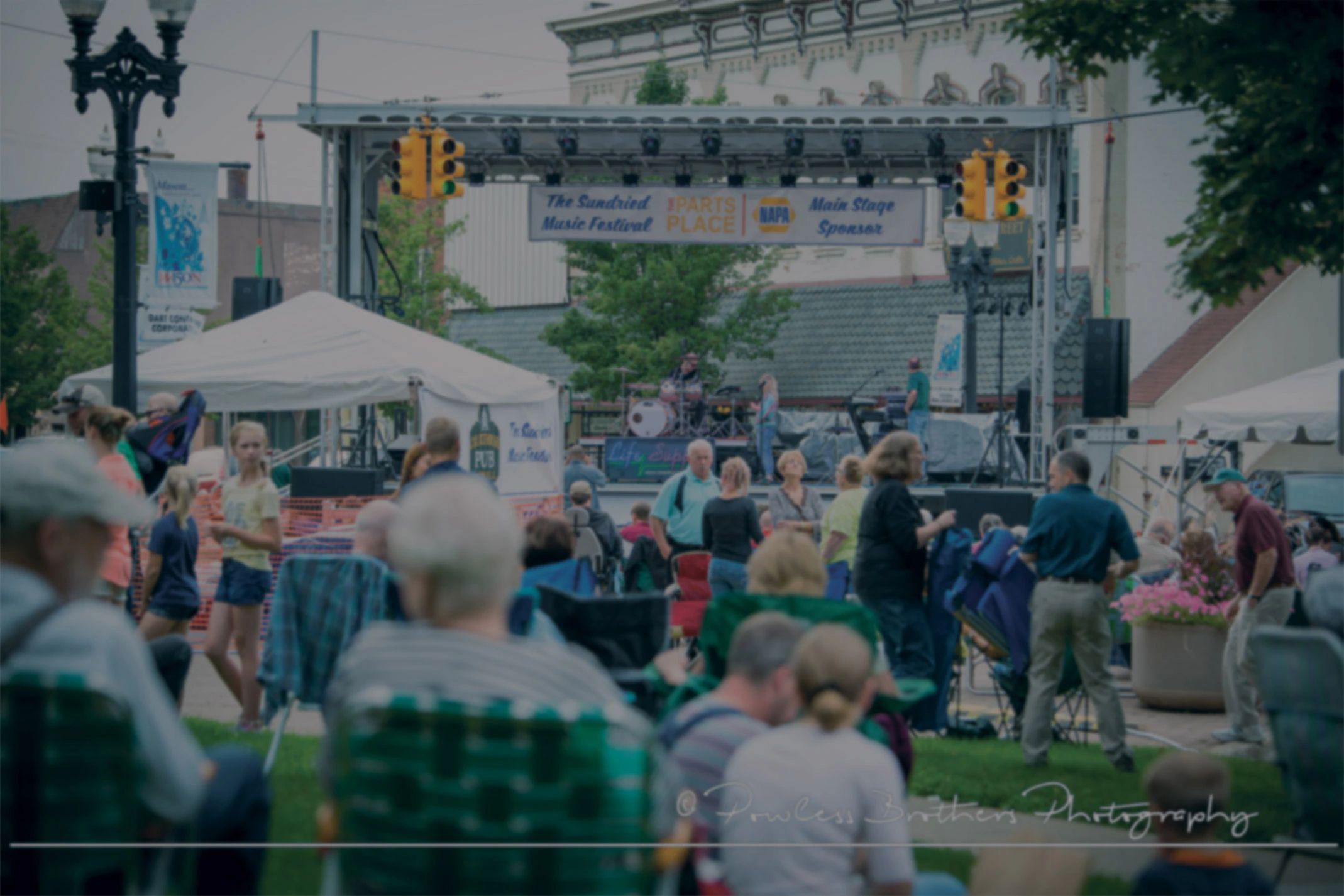 Crowd enjoying the Sun-Dried Music Festival in downtown Mason